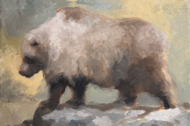 Painting of a brown bear on a rock