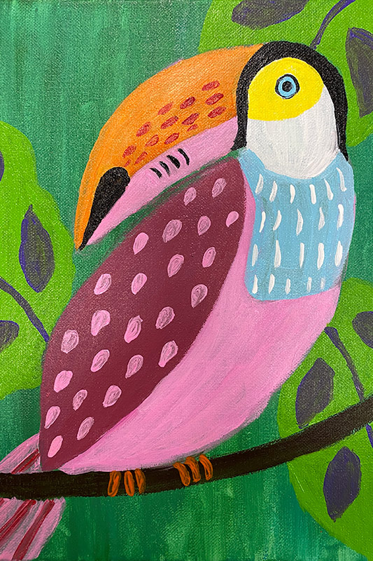 Painting of a toucan in a tree