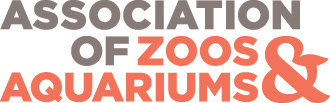 Logo for the Association of Zoos & Aquariums. The words ASSOCIATION OF are in gray, while ZOOS & AQUARIUMS is in orange with an ampersand shaped like an animal face.
