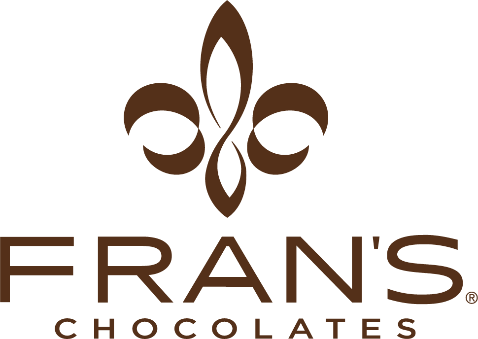 Frans Chocolates logo featuring a stylized brown fleur-de-lis above the words FRANS CHOCOLATES in bold, modern, uppercase brown letters on a light background.