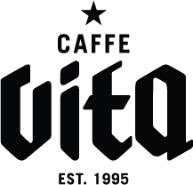 Black and white logo for Caffe Vita with a star above the word “CAFFE,” stylized text “vita” in bold, angular letters, and “EST. 1995” below.